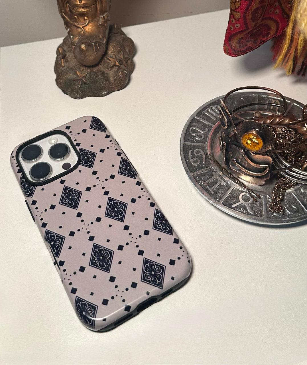 boho diamond flower motif Phone case with geometric pattern on a white surface