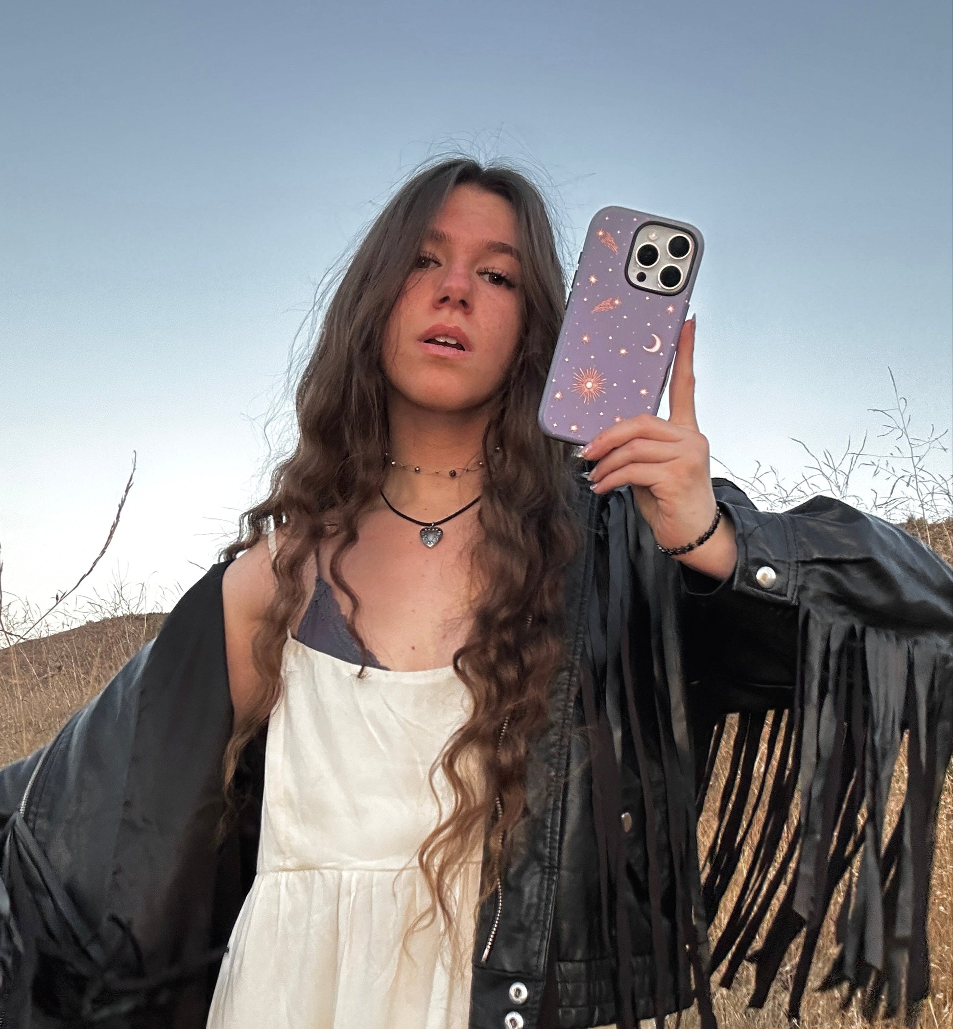 magsafe phone case with celestial sun, moon & shooting stars on purple blue background. Protective & stylish. Fits iPhone, Samsung & Google Pixel models. Boho chic, cute, and aesthetic model 