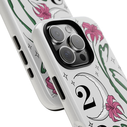 Phone case with pink lilies, crescent moon, 222 angel number on white background. twinkle stars Cute, aesthetic, protective design. Fits iPhone, Samsung & Google Pixel models. close up camera view